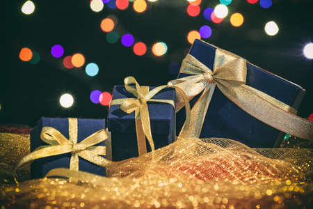 Blue gift boxes on christmas background