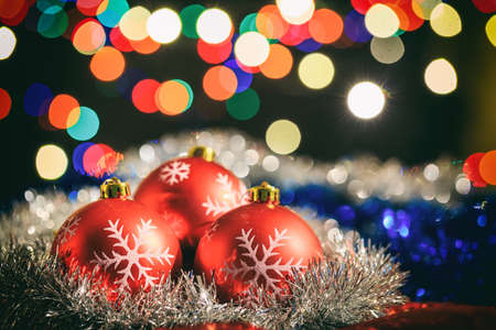 Christmas balls on a dark blur backgroundの写真素材