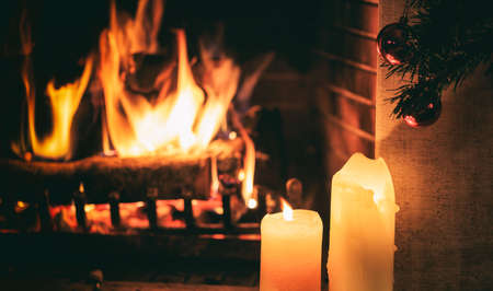 Burning logs in a fireplaceの写真素材