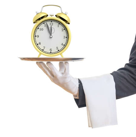 3d rendering golden alarm clock on a trayの写真素材