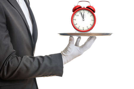 3d rendering red alarm clock on a trayの写真素材
