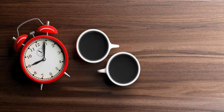 3d rendering red alarm clock on wooden backgroundの写真素材