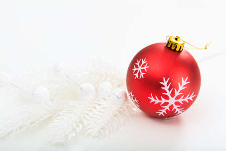Red christmas ball on white backgroundの写真素材