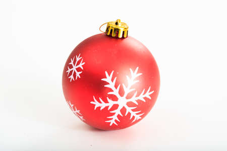 Red christmas ball on white backgroundの写真素材