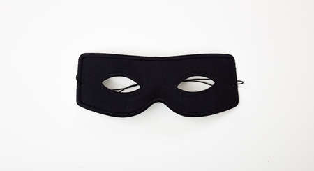 Black carnival mask isolated on white backgroundの写真素材