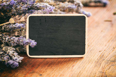 Lavender bunch and label on wooden backgroundの写真素材