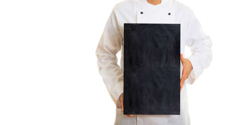 Chef holding a board isolated on white backgroundの写真素材
