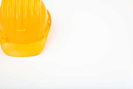 Yellow hard hat isolated on white backgroundの写真素材