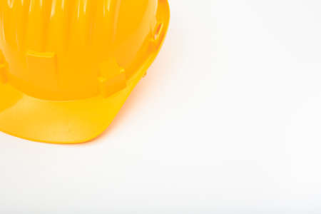 Yellow hard hat isolated on white backgroundの写真素材