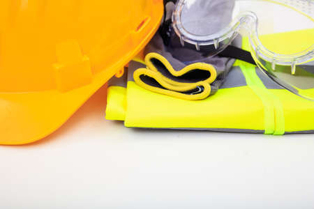 Hard hat and safety equipment on white backgroundの写真素材