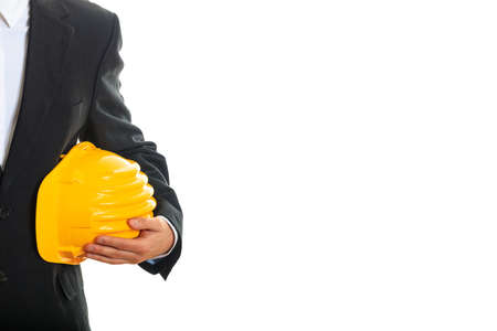 Engineer holding a hard hat on white background