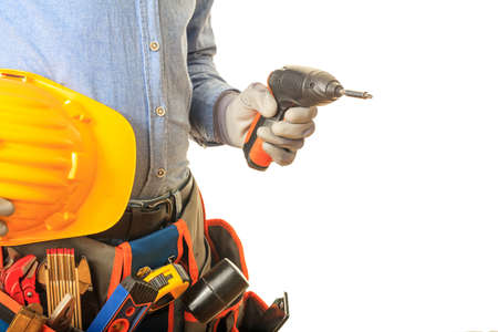 Worker holding an electric screwdriver on white background