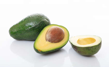Avocados close up isolated on white backgroundの写真素材