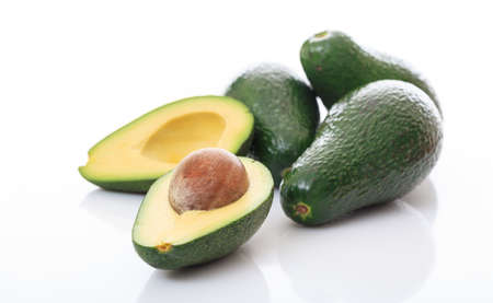 Avocados close up isolated on white backgroundの写真素材