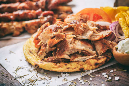 Greek gyros dish on a wooden backgroundの写真素材