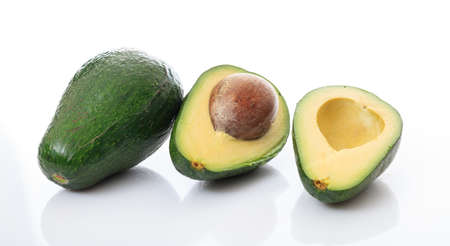 Avocados close up isolated on white backgroundの写真素材