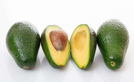 Avocados close up isolated on white backgroundの写真素材