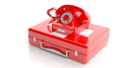 Red old telephone isolated on a first aid kit on white background. 3d illustrationの写真素材