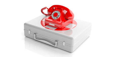 Red old telephone isolated on a first aid kit on white background. 3d illustrationの写真素材