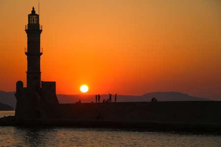 Beautiful sunset over sea water. Greece, Crete Chania portの写真素材