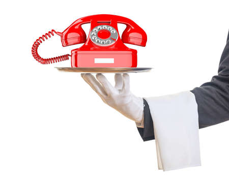 Waiter offering a red old telephone on white background. 3d illustrationの写真素材