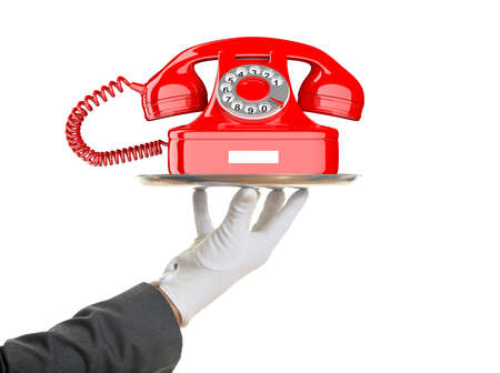 Waiter offering a red old telephone on white background. 3d illustrationの写真素材
