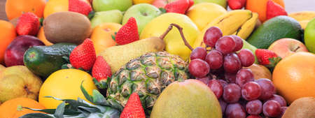 A variety of colorful fresh fruits backgroundの写真素材