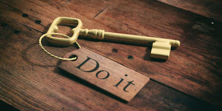 Old metal key with do it tag on a wooden background. 3d illustrationの写真素材