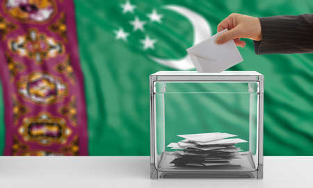 Voter on an waiving Turkmenistan flag background. 3d illustrationの写真素材