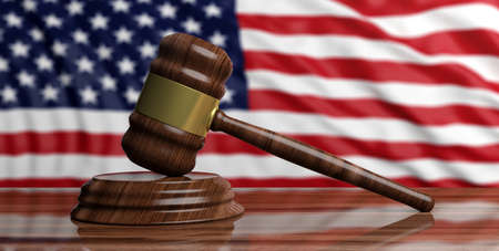 Auction gavel on United States of America flag background. 3d illustrationの写真素材
