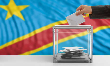 Voter on an waiving Congo flag background. 3d illustrationの写真素材
