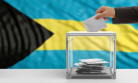 Voter on an waiving Bahamas flag background. 3d illustrationの写真素材