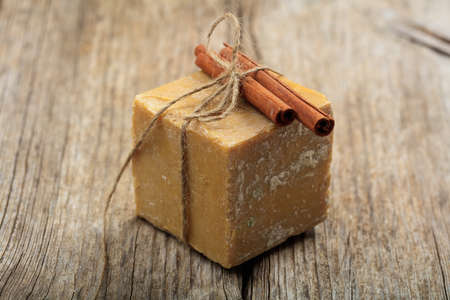 Natural handmade soap bar on wooden backgroundの写真素材