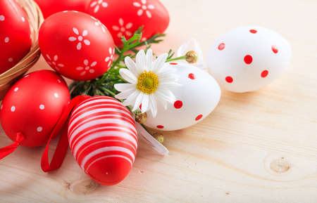 Colorful Easter eggs decoration and copy space on wooden backgroundの写真素材