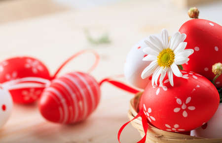 Colorful Easter eggs decoration on wooden backgroundの写真素材