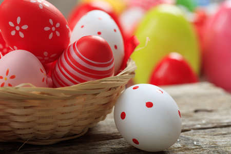 Colorful Easter eggs decoration on wooden backgroundの写真素材