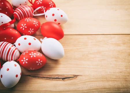 Easter eggs on wooden background and copy spaceの写真素材
