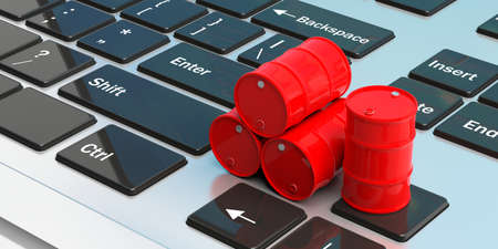 Red oil barrels on a laptop. 3d illustrationの写真素材