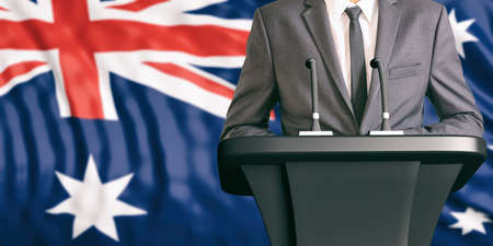 Businessman or politician making speech on Australia flag background. 3d illustrationの写真素材