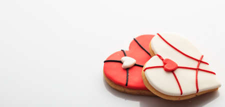 Heart shaped biscuits isolated on white backgroundの写真素材
