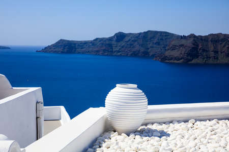 Santorini island, Greece - White roofs and caldera viewの写真素材