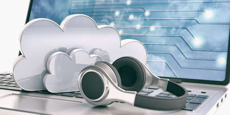 Computer cloud and headphones on a laptop on white background. 3d illustrationの写真素材