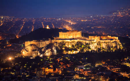 Acropolis of Athens, Greece at night, on Athens city backgroundの写真素材