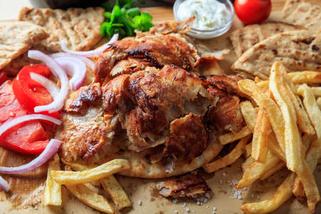 Greek gyros dish on a wooden backgroundの写真素材