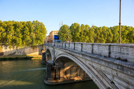 Bridge over Tiber river in Rome, Italyの写真素材