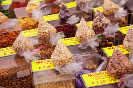 Dried fruits and nuts for sale in a market in Rome, Italyの写真素材