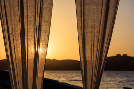 Greece, Kea island. Sunset over the seaの写真素材