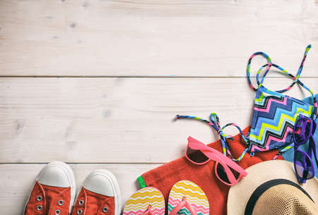 Summer vacation concept on white wooden background - top viewの写真素材