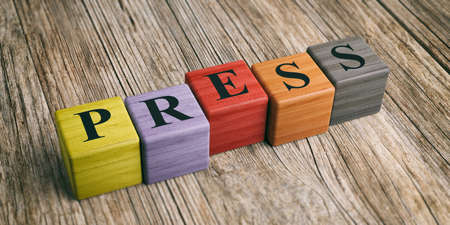 Word Press on wooden blocks and wooden background. 3d illustrationの写真素材