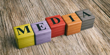 Word Media on wooden blocks and wooden background. 3d illustrationの写真素材
